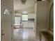 Cozy kitchen with modern appliances, white cabinetry, and tiled floors at 123 S Roma Way, Kissimmee, FL 34746