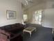 Spacious living room offers a dining area and view of the kitchen at 123 S Roma Way, Kissimmee, FL 34746
