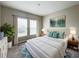 Stylishly furnished bedroom featuring a cozy queen-sized bed and decorative accents at 1404 Axel Cir, Winter Haven, FL 33880