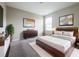 Bedroom featuring a rustic wooden bed frame and wood dresser at 1404 Axel Cir, Winter Haven, FL 33880