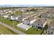 Aerial shot showcasing home within community, ample backyard space and neighborhood layout at 1765 Petiole Pl, Kissimmee, FL 34744