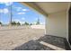 A large fenced backyard features an extensive paved area, perfect for outdoor entertaining at 1765 Petiole Pl, Kissimmee, FL 34744