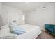 Bedroom with carpet, window, accent chair, and double-door closet at 1765 Petiole Pl, Kissimmee, FL 34744