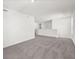 Large living room with neutral carpet and plenty of space for customization at 1765 Petiole Pl, Kissimmee, FL 34744
