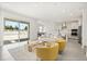 Open-concept living area with a patio door and a seamless flow into the kitchen at 1765 Petiole Pl, Kissimmee, FL 34744