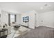 Cozy living room with plush seating and carpeted floors at 1765 Petiole Pl, Kissimmee, FL 34744