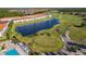 Beautiful aerial view showcases community golf course, ponds, and resort-style living at 2000 Greenbriar Ter, Davenport, FL 33837