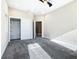 This carpeted bedroom has nice closet space, ceiling fan, and natural light at 2000 Greenbriar Ter, Davenport, FL 33837
