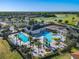 Aerial view of the luxurious community pool featuring a lazy river and play area at 2000 Greenbriar Ter, Davenport, FL 33837