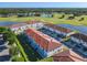 Beautiful modern townhomes set against the backdrop of a golf course, and lush landscaping at 2000 Greenbriar Ter, Davenport, FL 33837