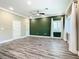 Spacious room with modern flooring and a large window, offering plenty of natural light at 2000 Greenbriar Ter, Davenport, FL 33837