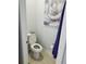 Powder room featuring toilet and artwork at 212 Grouper Ct, Poinciana, FL 34759