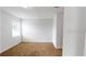 Bedroom with carpet, a neutral color palette, and a window at 212 Grouper Ct, Poinciana, FL 34759