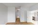 Hallway with brown carpet that leads to the bathroom at 212 Grouper Ct, Poinciana, FL 34759
