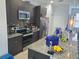 Close up of kitchen featuring granite countertops and stainless steel appliances at 212 Grouper Ct, Poinciana, FL 34759