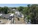 An aerial view of the home, with an arched entrance and a well-kept, fenced-in yard at 2409 E Magnolia St, Lakeland, FL 33801