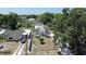 An aerial view of the home, with an arched entrance and a well-kept, fenced-in yard at 2409 E Magnolia St, Lakeland, FL 33801