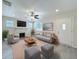 Bright living room with a fireplace and hardwood floors, perfect for relaxation and entertaining at 2409 E Magnolia St, Lakeland, FL 33801