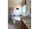 Relaxing bathroom with a soaking tub, separate shower, and vanity with counter space at 2514 Dharma Cir, Kissimmee, FL 34746