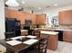 Well-equipped kitchen with appliances, breakfast bar, and plenty of counter space at 2514 Dharma Cir, Kissimmee, FL 34746