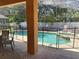 Screened-in pool with -safety fence, connected jacuzzi, and outdoor seating at 2514 Dharma Cir, Kissimmee, FL 34746