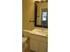 Bathroom featuring tile flooring, granite countertop, and an ornate mirror at 2673 Rainbow Springs Ln, Orlando, FL 32828