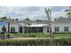 Community clubhouse with water fountains, manicured landscaping, and outdoor recreation areas at 2673 Rainbow Springs Ln, Orlando, FL 32828