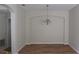 Bright dining room showcasing hardwood floors and decorative chandelier at 2673 Rainbow Springs Ln, Orlando, FL 32828