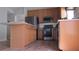 Spacious kitchen featuring stainless steel appliances, granite countertops, and a breakfast bar at 2673 Rainbow Springs Ln, Orlando, FL 32828