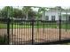 Community playground with swings and fenced area for  at 2673 Rainbow Springs Ln, Orlando, FL 32828
