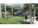 Community playground featuring slides, climbing structures, and a shaded canopy for ' recreation and fun at 2673 Rainbow Springs Ln, Orlando, FL 32828