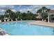 Beautiful community swimming pool with ample seating at 2673 Rainbow Springs Ln, Orlando, FL 32828