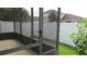Screened porch features a secure enclosure with views of the fenced backyard at 2673 Rainbow Springs Ln, Orlando, FL 32828