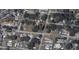 Overhead view of 2704 Sample Street and surrounding neighborhood and streets at 2704 Sample St, Kissimmee, FL 34744
