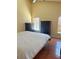 Inviting bedroom with hardwood floors, natural light, and a simple design at 2779 Theresa Dr, Kissimmee, FL 34744