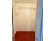 Walk-in closet with shelves and hardwood floors at 2779 Theresa Dr, Kissimmee, FL 34744