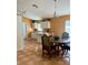 Eat-in kitchen with tile floors, breakfast bar and adjacent dining area at 2779 Theresa Dr, Kissimmee, FL 34744
