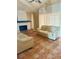 Spacious living room with a cozy fireplace and large windows providing natural light at 2779 Theresa Dr, Kissimmee, FL 34744