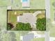 Aerial boundary view outlining the property, including the house, driveway, and surrounding greenery at 2947 Larson St, Kissimmee, FL 34741