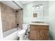 Bathroom features neutral colored walls, bathtub, and vanity at 2947 Larson St, Kissimmee, FL 34741