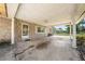 Stone carport features columns and access to the front door of the house at 2947 Larson St, Kissimmee, FL 34741
