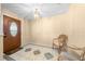 Inviting entryway features a tile floor and a chandelier at 2947 Larson St, Kissimmee, FL 34741