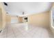 Bright and spacious living area with tile floors at 2947 Larson St, Kissimmee, FL 34741