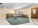 Cozy living room featuring furniture set and ample sunlight at 2947 Larson St, Kissimmee, FL 34741