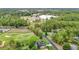 Aerial view showcasing the proximity of Lake Diamond homes to the golf course and community amenities at 30 Lake Diamond Ave, Ocala, FL 34472
