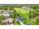 Scenic aerial view displaying golf course community surrounded by trees at 30 Lake Diamond Ave, Ocala, FL 34472