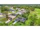 Panoramic aerial shot displays lush landscape, golf course and community streets at 30 Lake Diamond Ave, Ocala, FL 34472