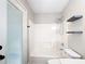 Bathroom featuring a shower/tub combination and a window at 30 Lake Diamond Ave, Ocala, FL 34472