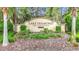 Lake Diamond Golf & Country Club signage surrounded by greenery and foliage at 30 Lake Diamond Ave, Ocala, FL 34472