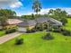 Well-maintained single-story home with lush lawn, tidy landscaping, and inviting curb appeal at 30 Lake Diamond Ave, Ocala, FL 34472